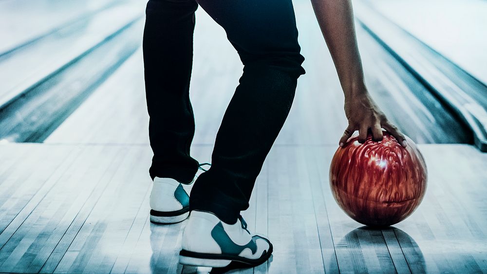 African American bowling at a hall wallpaper