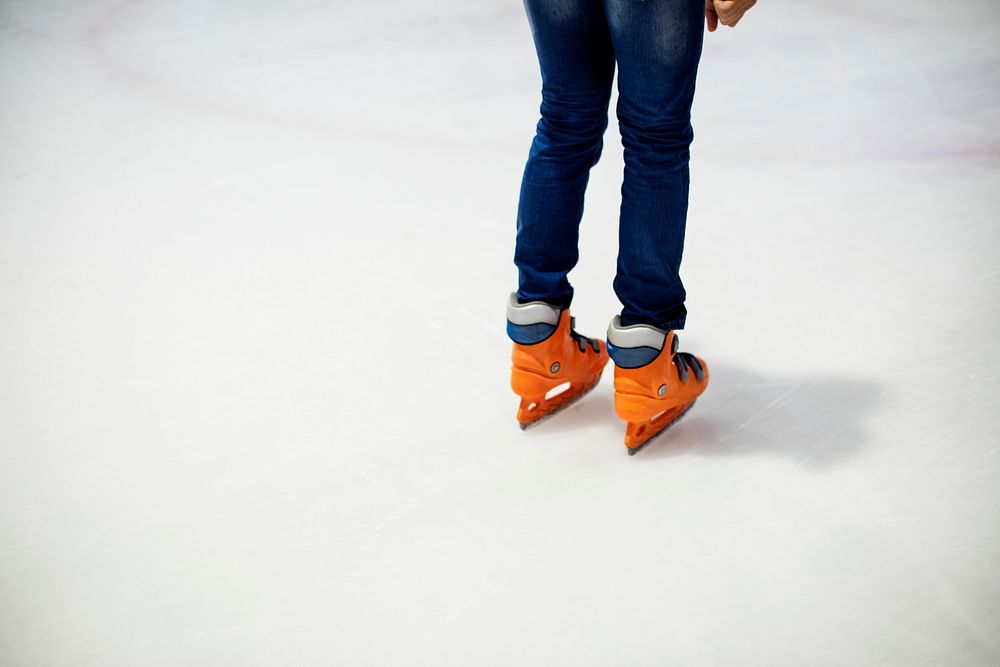 Ice skating on the ice rink leisure and fun lifestyle concept