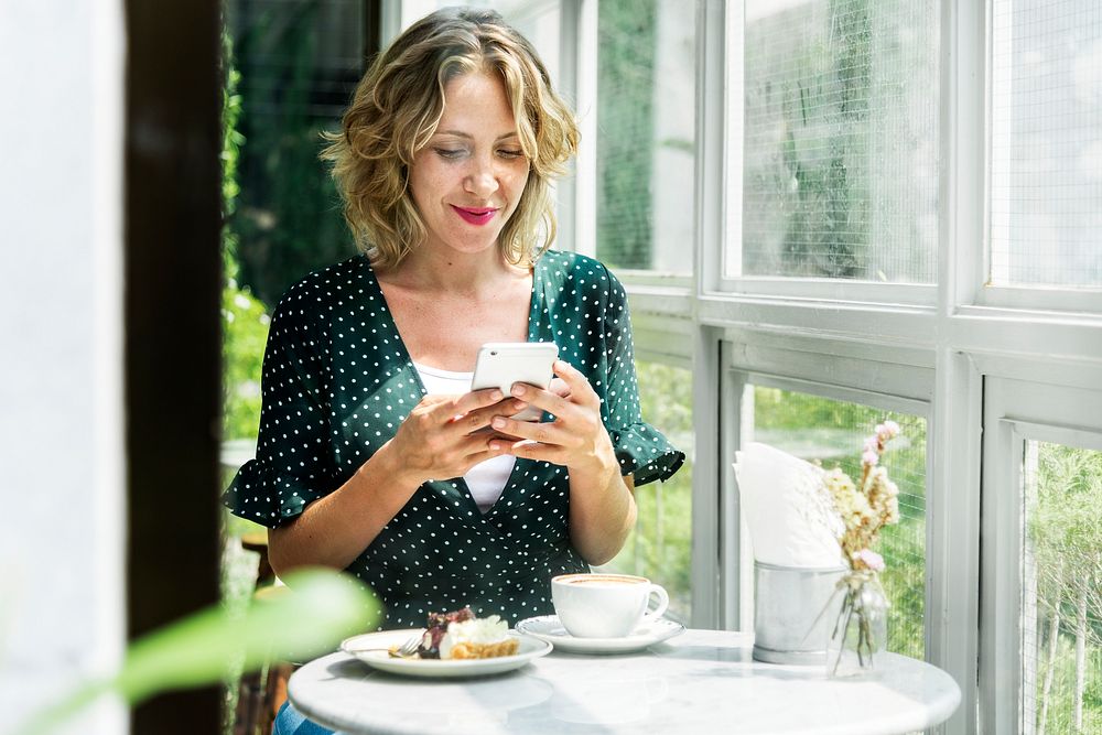 Caucasian woman with a smartphone