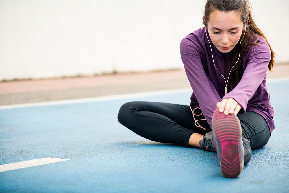 Woman stretching before exercise