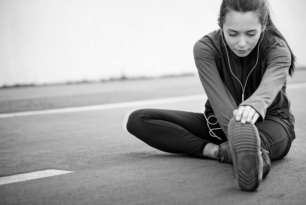 Woman stretching before exercise