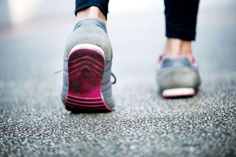 Woman walking on a road