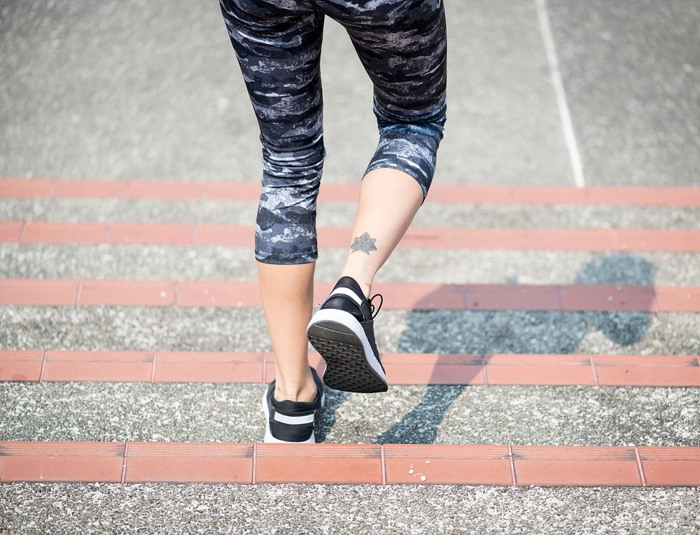 Woman walking down the stair