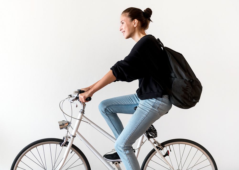 White woman riding a bike