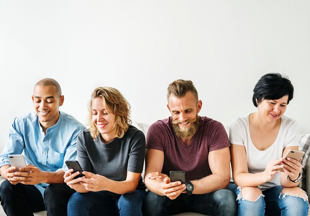 Diverse friends using phones isolated