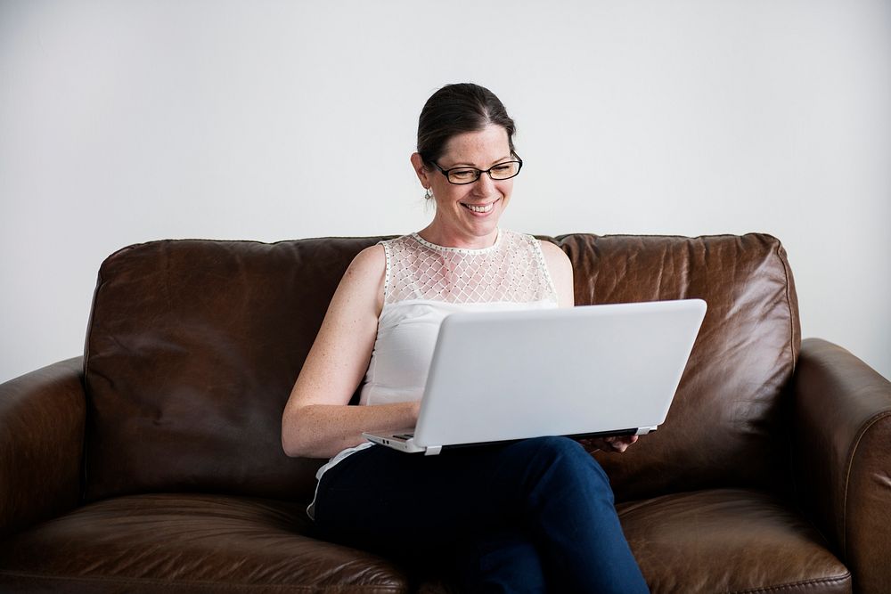 White woman using laptop