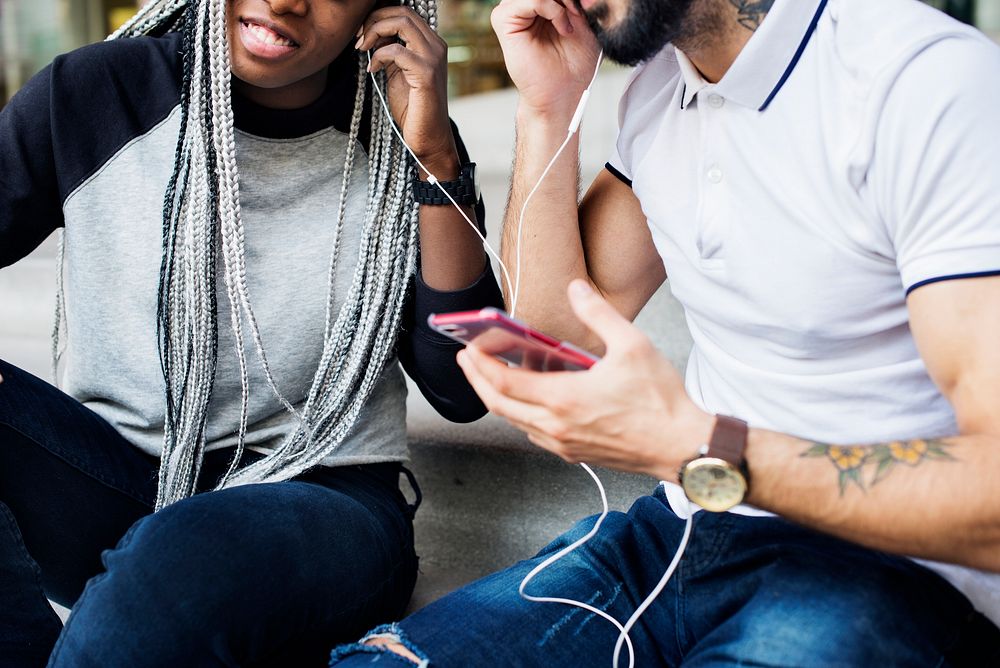 A couple listening to the music together