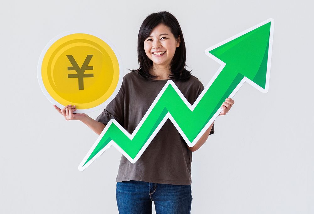 Happy Asian woman holding a Japanese Yen icon