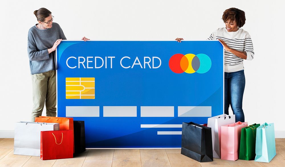 People holding a credit card