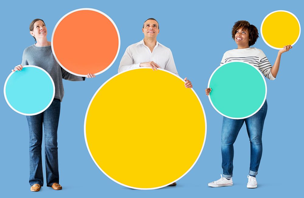 Diverse people holding colorful circles