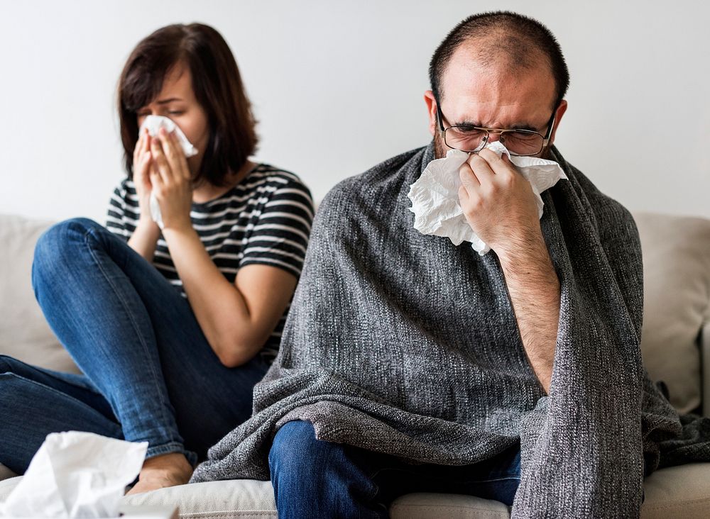 Couple sick together at home