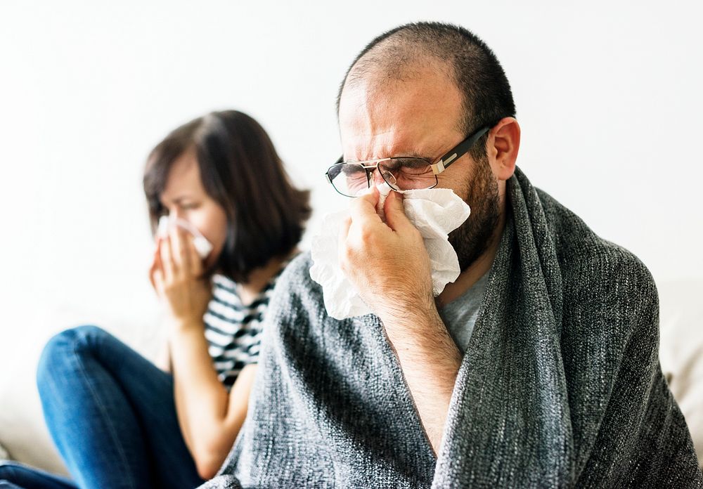 Couple sick together at home