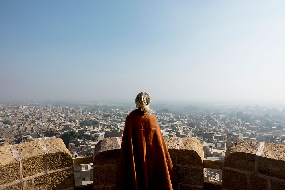 Western woman exploring Jaisalmer Fort, Rajasthan, India