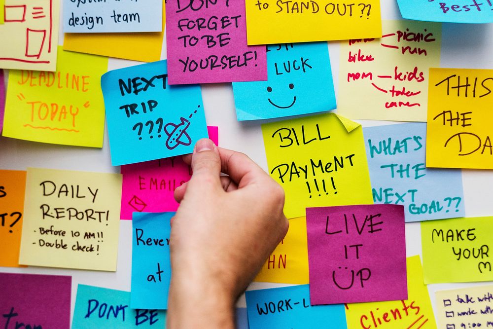 Sticky notes on an office wall