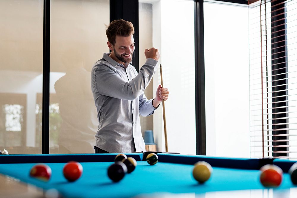Man playing pool by himself