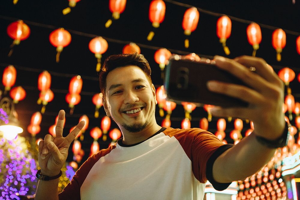 Man taking selfie at lantern festval