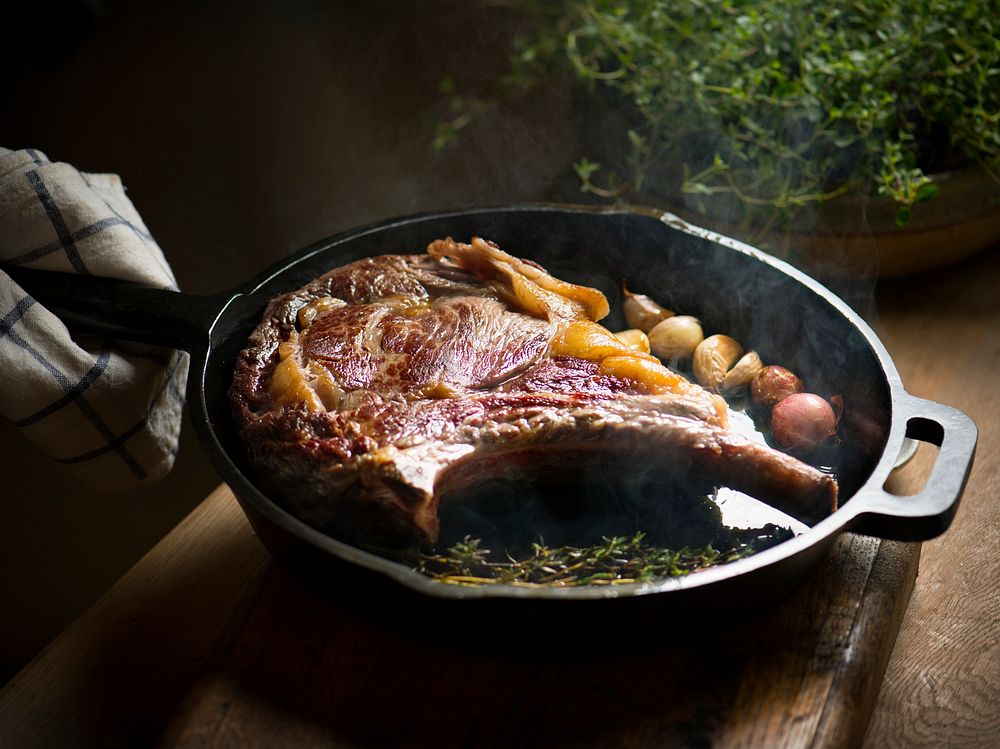 Cooking lamb steak on a pan food photography recipe idea