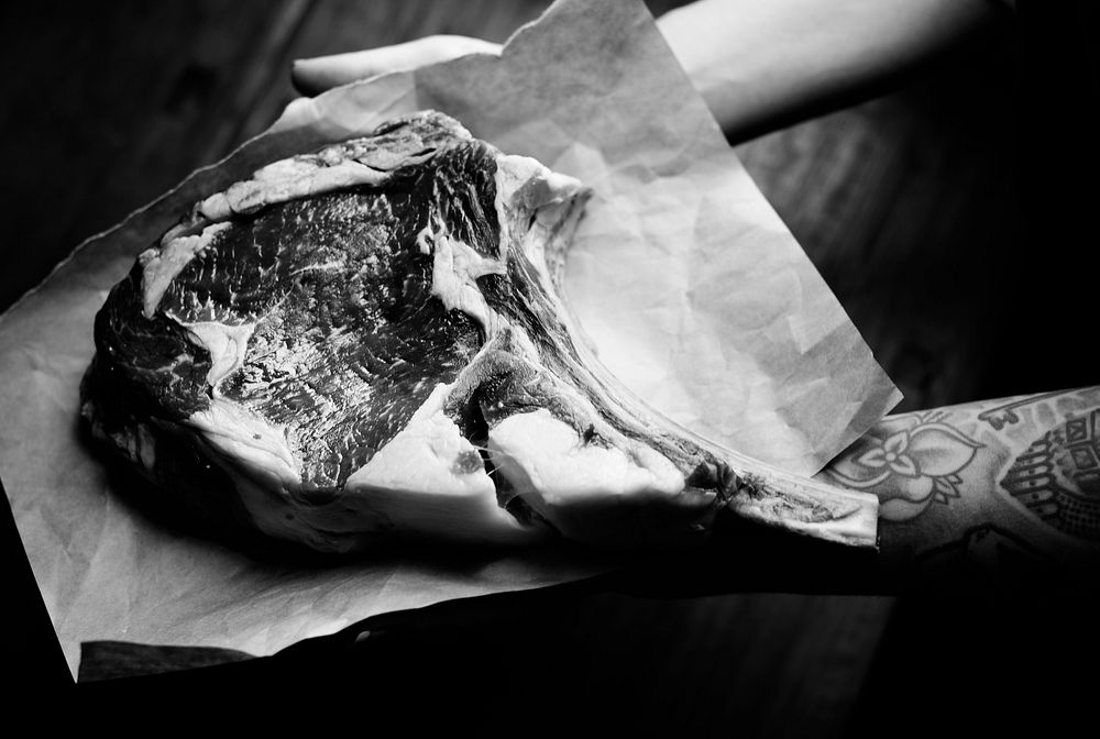 Raw tomahawk steak food photography recipe idea