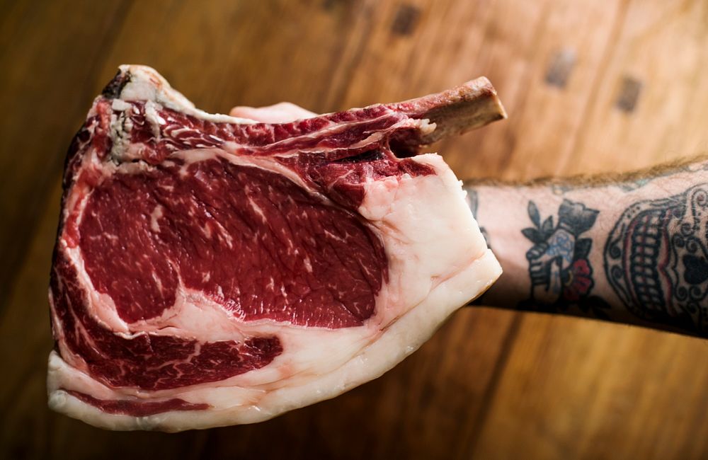 Raw tomahawk steak food photography recipe idea