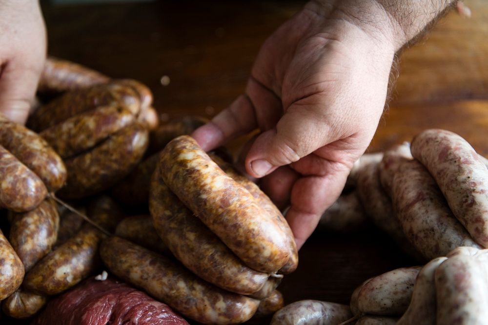 Smoked homemade sausage in a kitchen