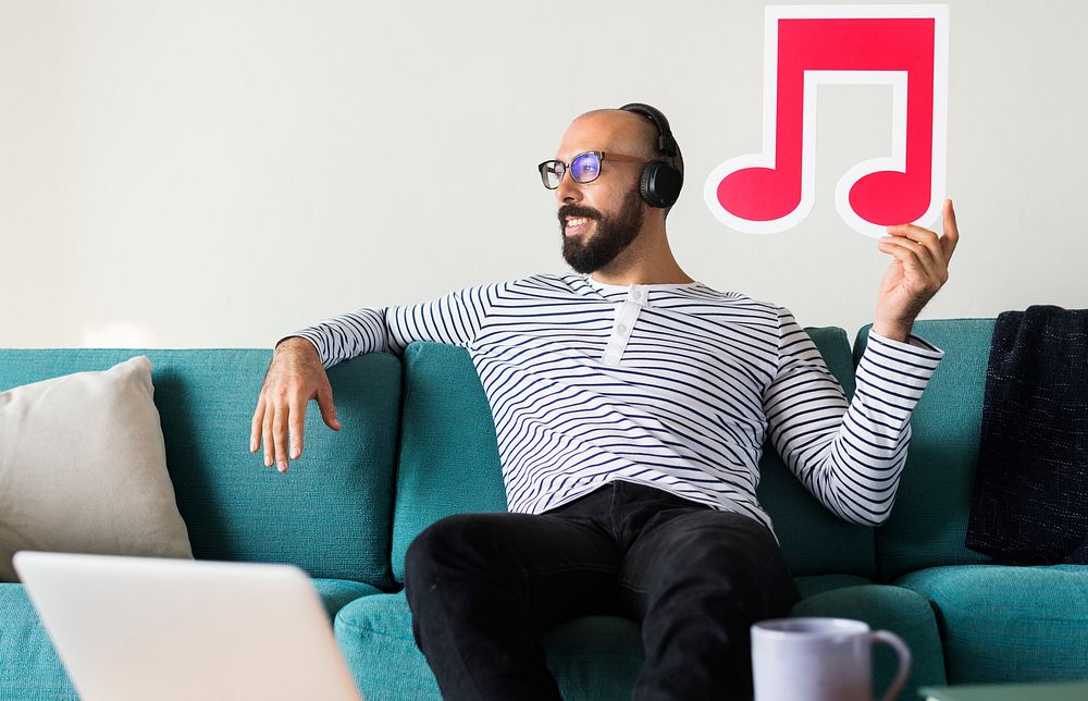 Man enjoying music at home