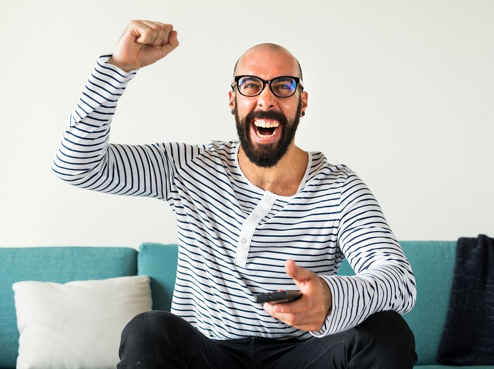 Cheerful person sitting on the couch