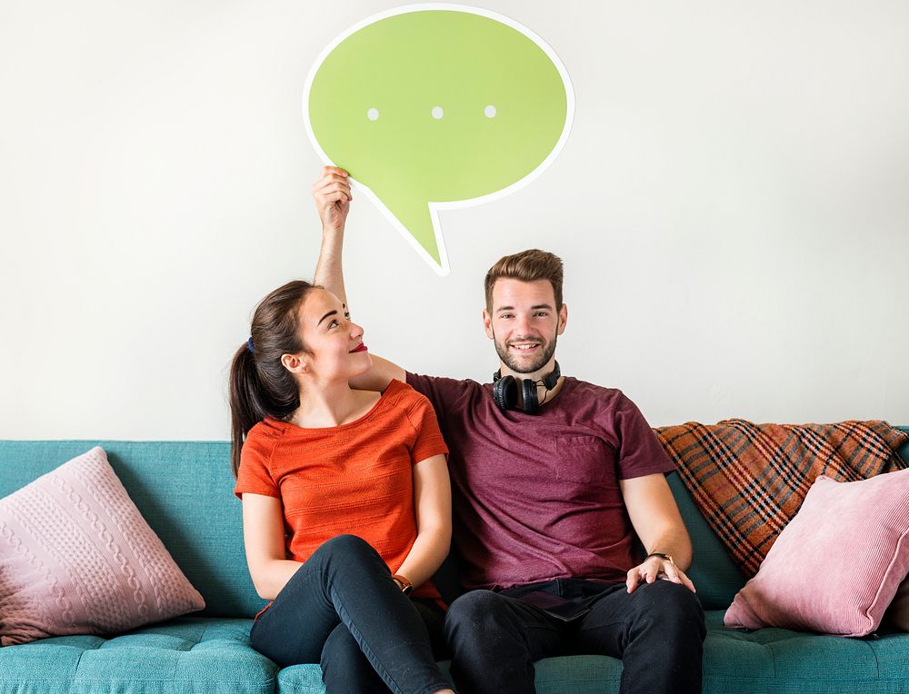 Couple with speech bubble icon