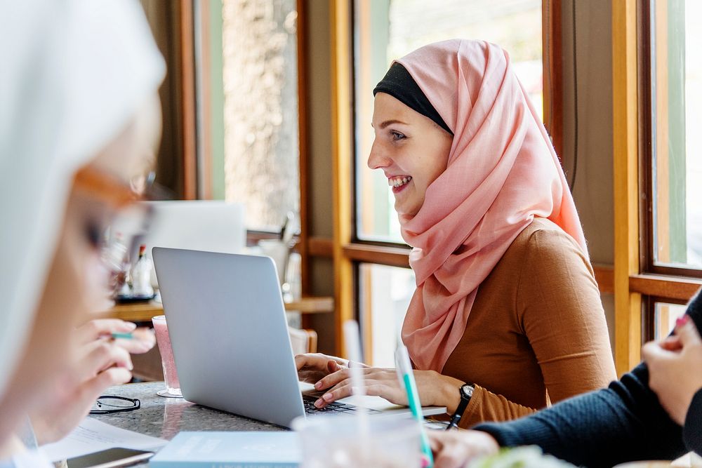 islamic women friends working together