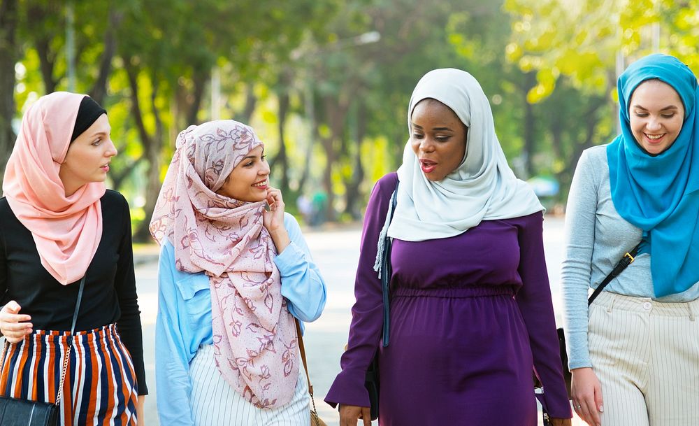 Muslim women walking and talking together
