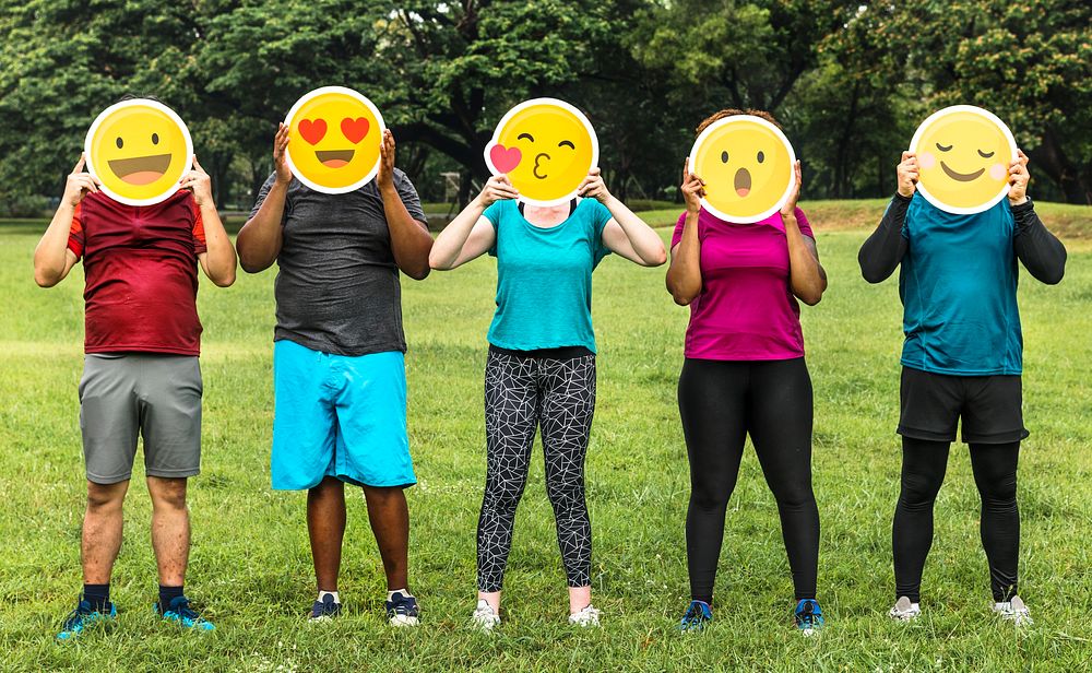 Group of diverse people with emoticon