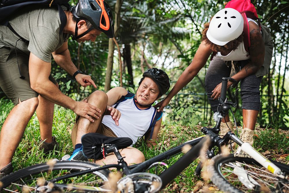 An injured cyclist in the forest