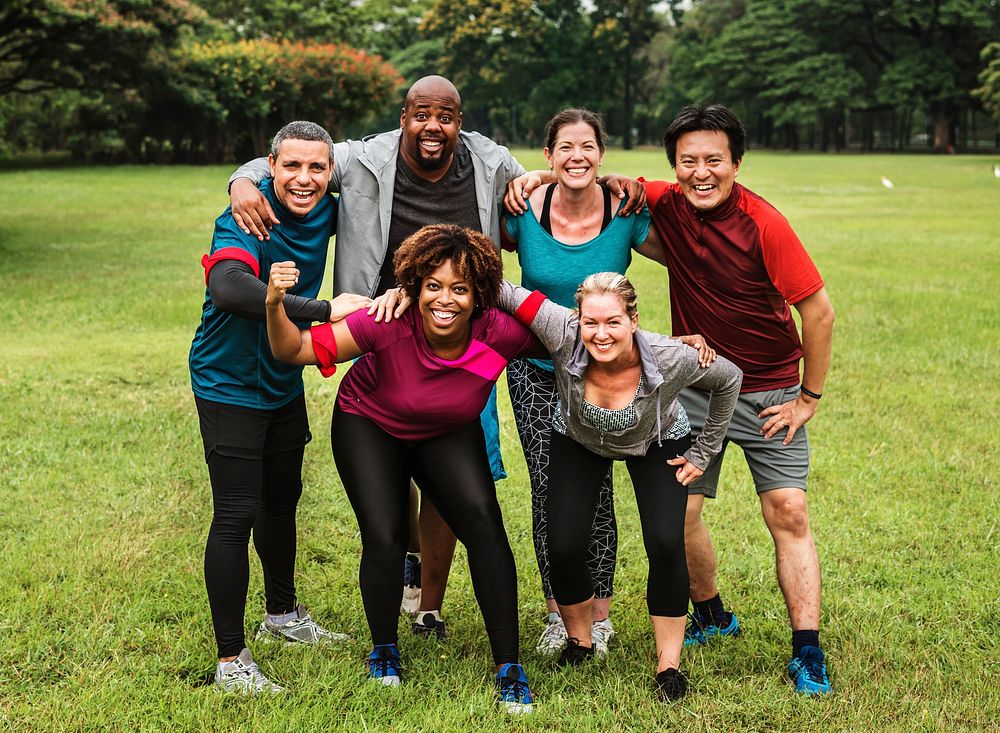 Group of cheerful diverse friends in the park