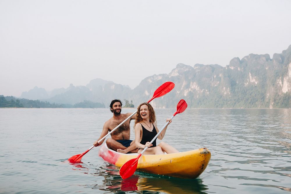 Couple paddling in a canoe