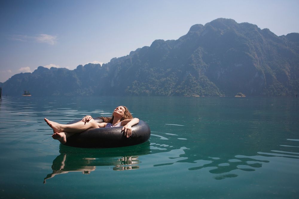 Woman relaxing on a floating ring