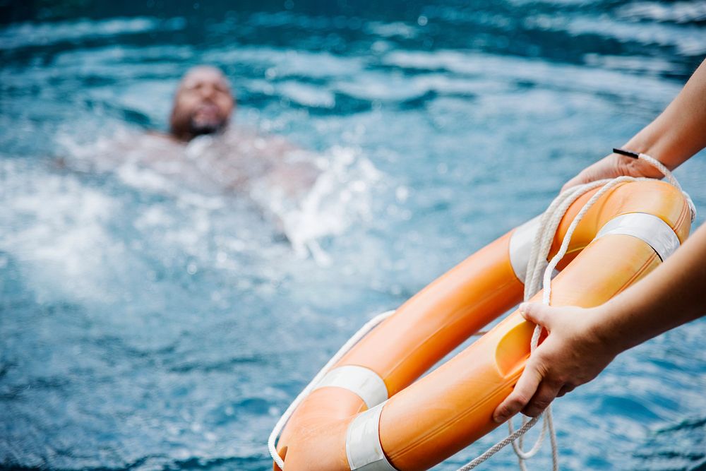 Man being rescued from the water