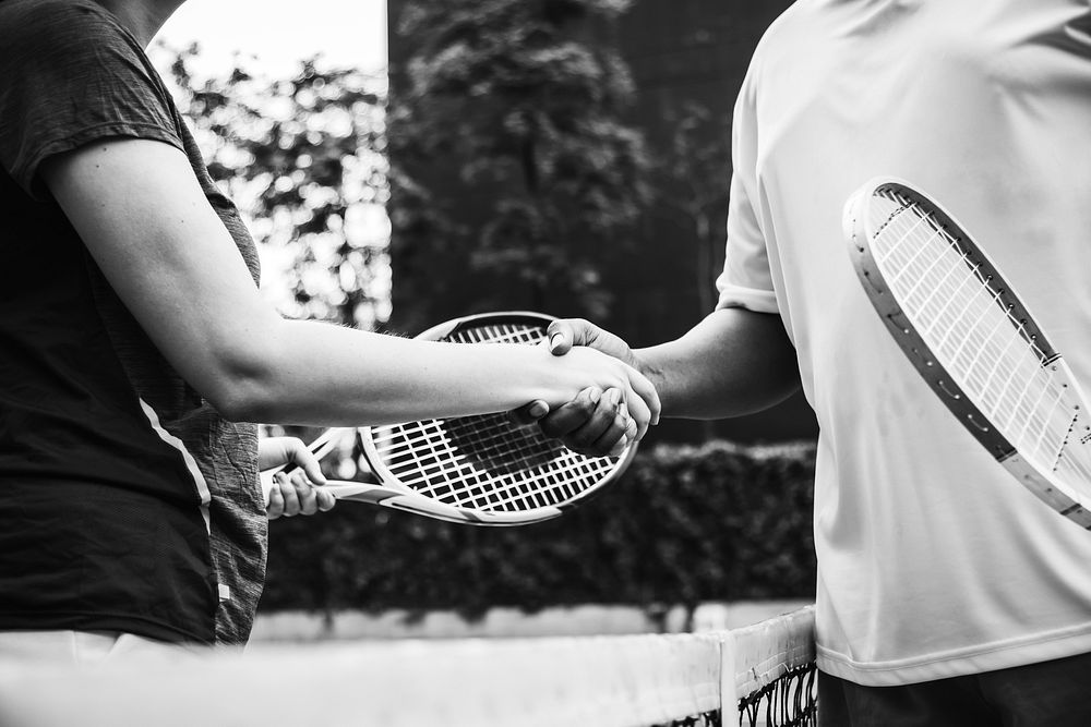 Players shaking hands after a tennis match