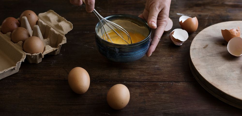 Woman whisking eggs food photography recipe idea