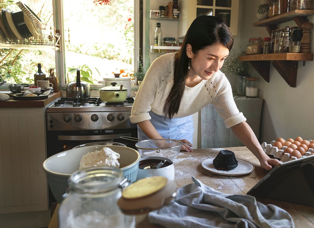 Japanese woman making a Chocolate lava cake
