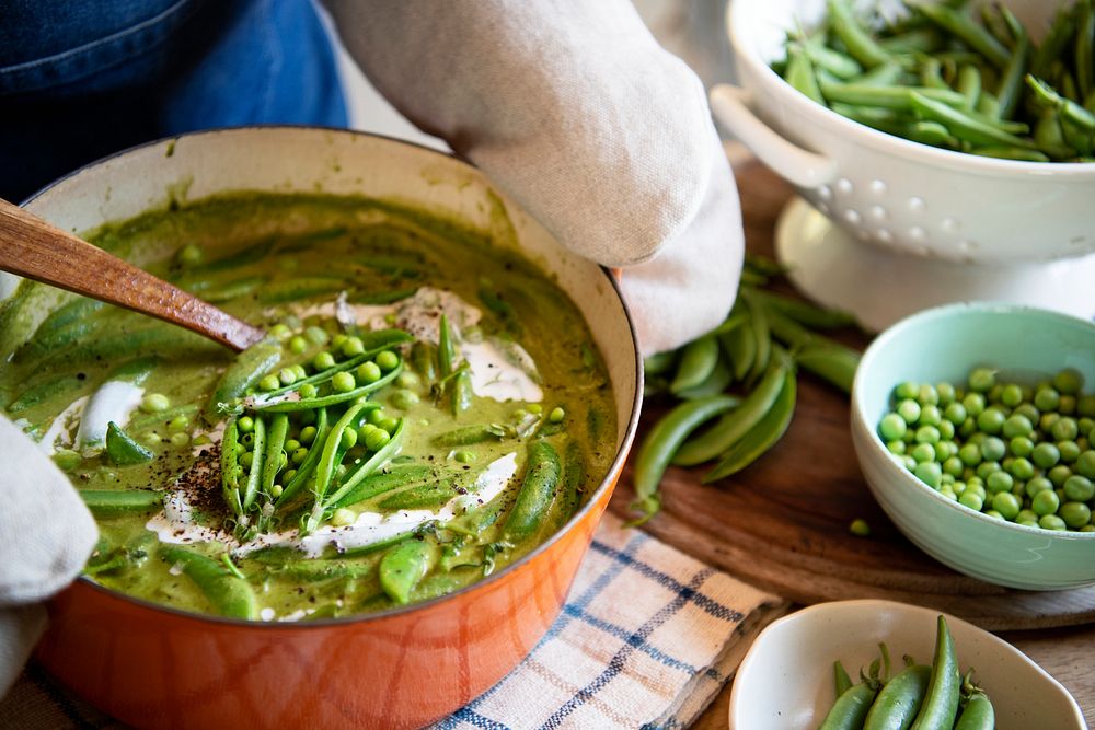 Close up of a green pea soup in a pot