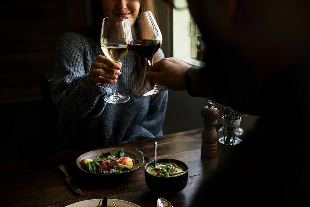 Couple at a romantic dinner with wine