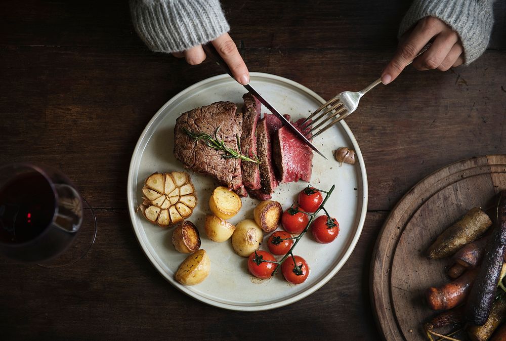 Close up of a cutting a fillet steak food photography recipe idea