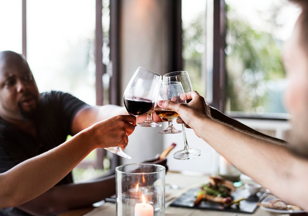 Friends drinking wine in a restaurant
