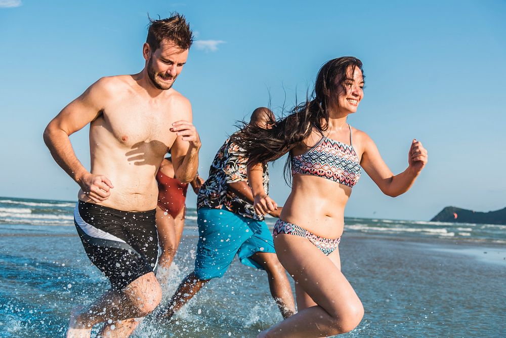 Friends having fun on the beach