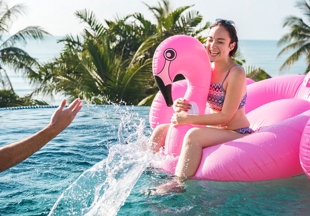 Women on a pool inflatable