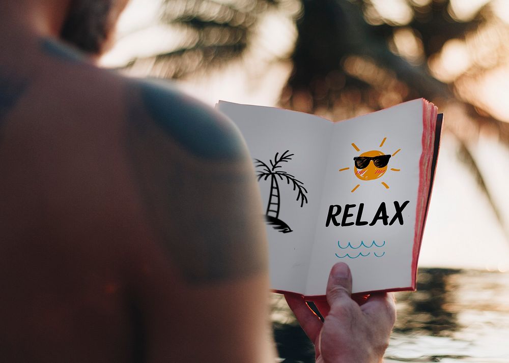 Man enjoying a book by the pool