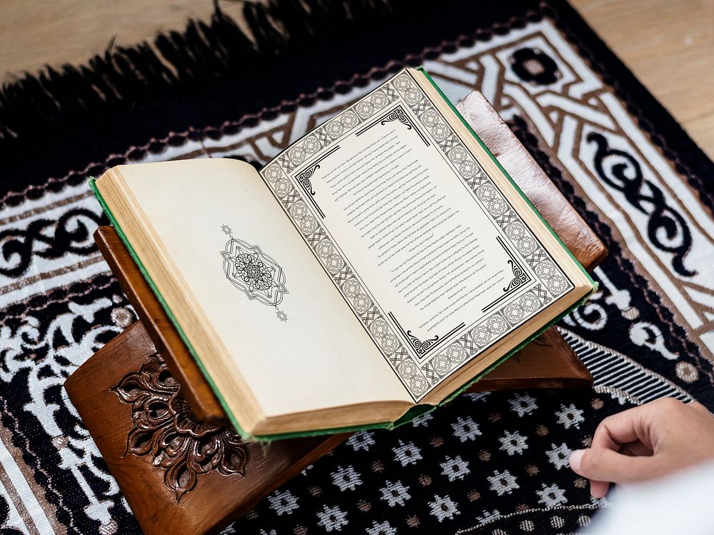 Muslim man studying The Quran