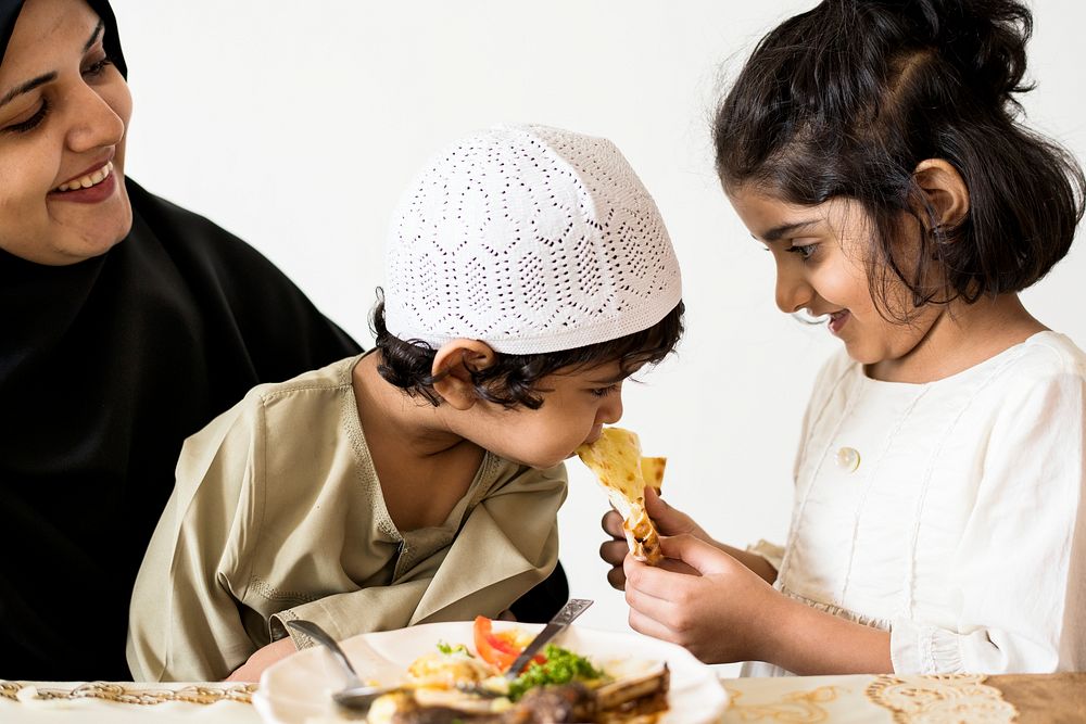 Muslim family having a meal