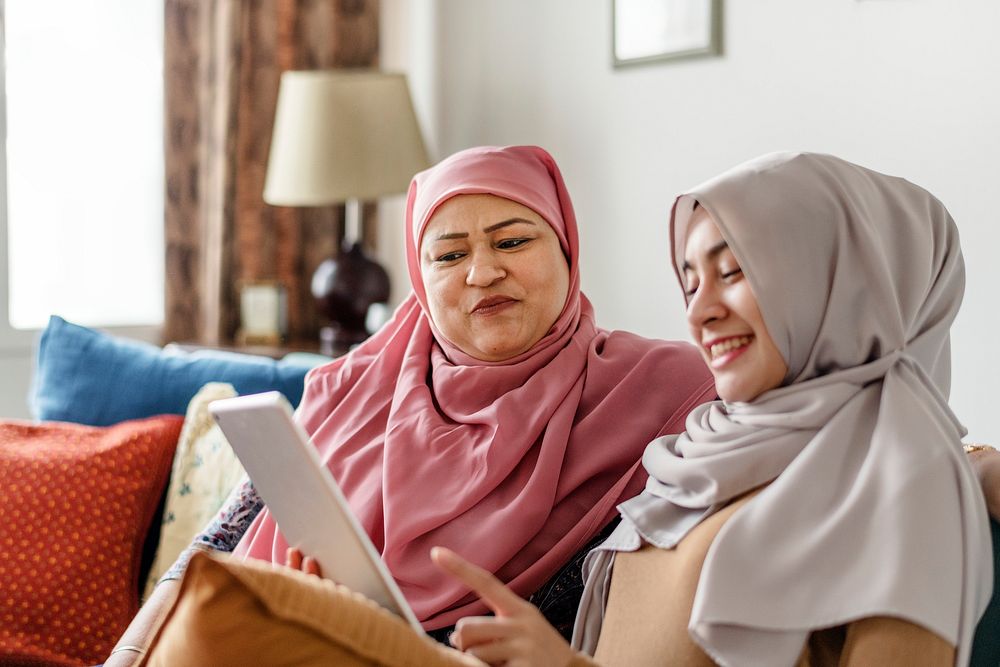 Muslim women using a tablet