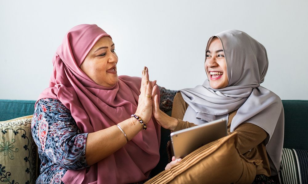 Muslim women using a tablet