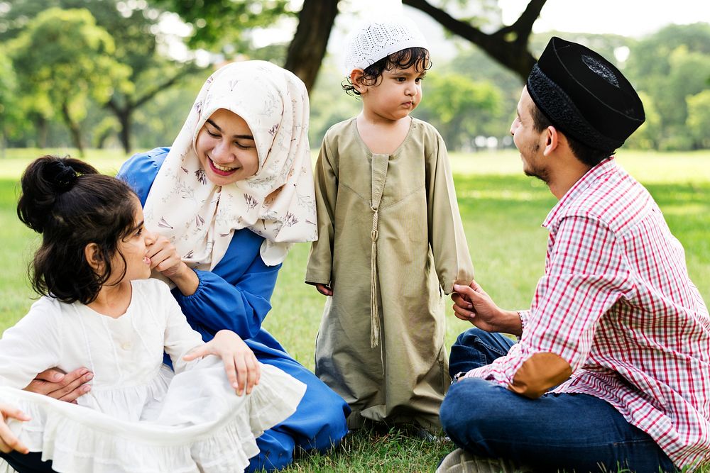 Muslim family having a good time outdoors